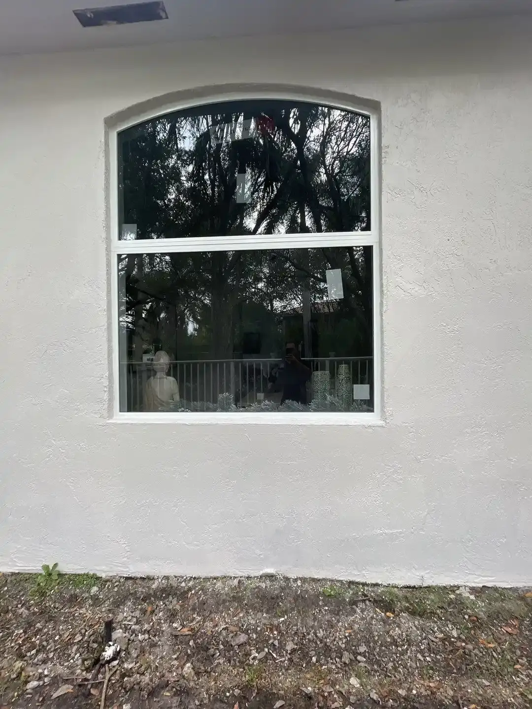 Impact awning window installed in a bathroom wall